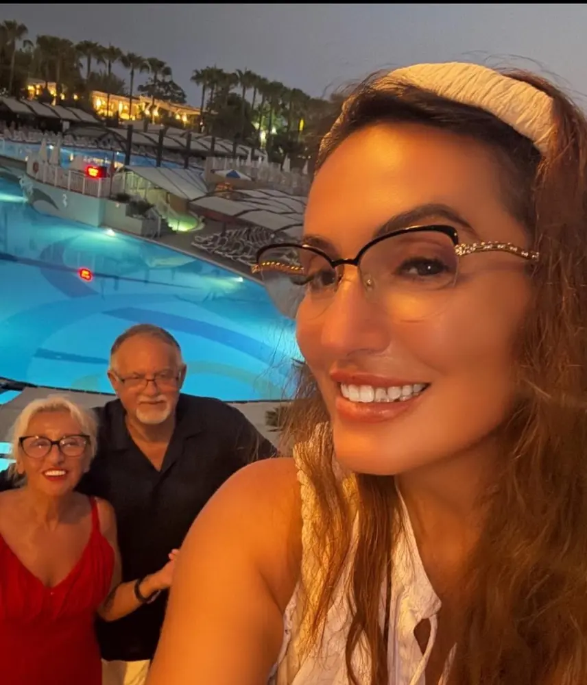 Dr. Venera Bekteshi with her parents